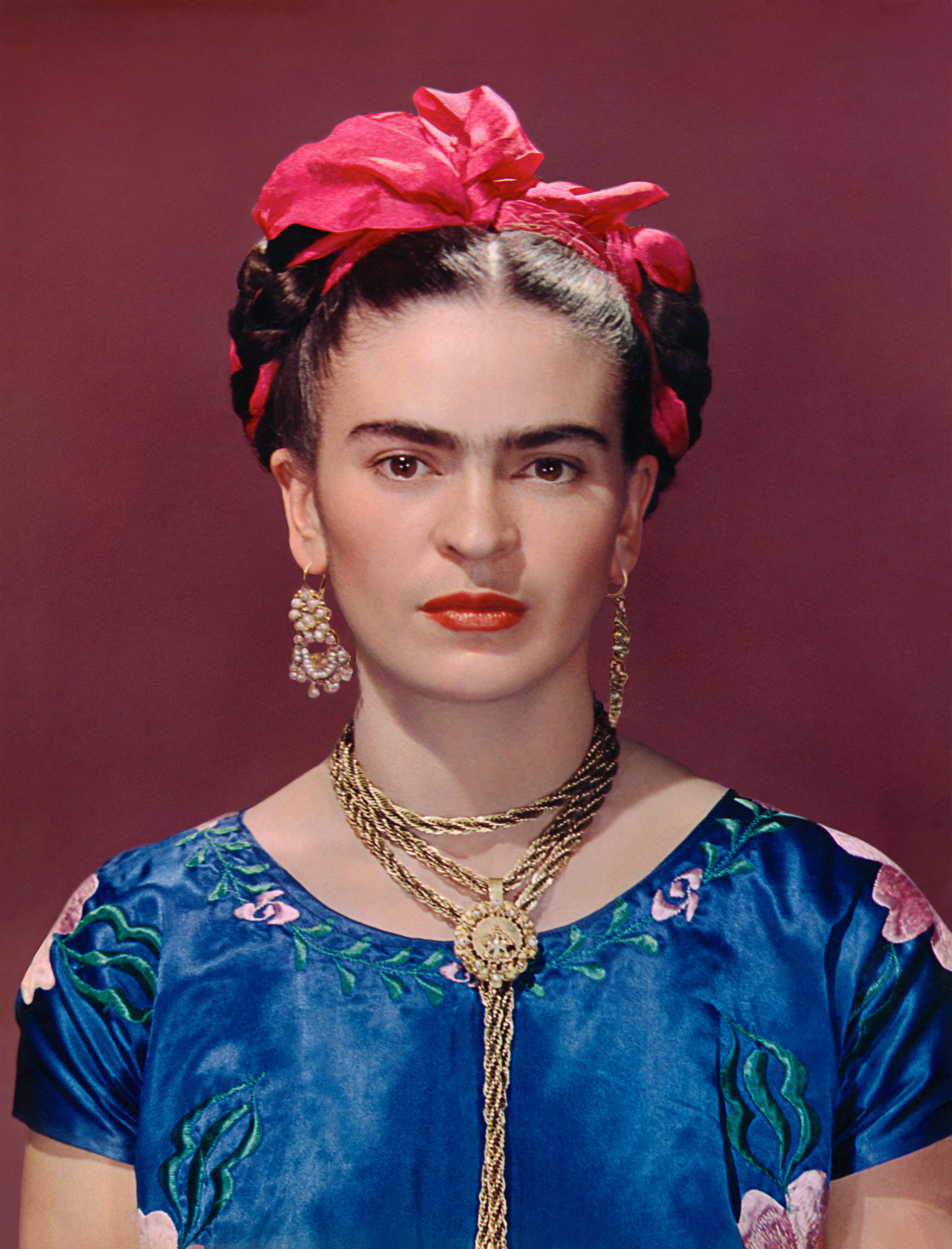 EXHIBITION BENDIGO Frida Kahlo in blue satin blouse_1939_photograph by Nickolas Muray_Nickolas Muray Photo Archives