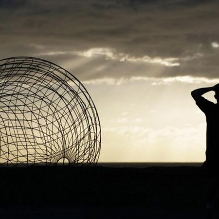 Matthew Harding with his work Nano for Sculpture by the Sea 2006; Photography Jamie Williams