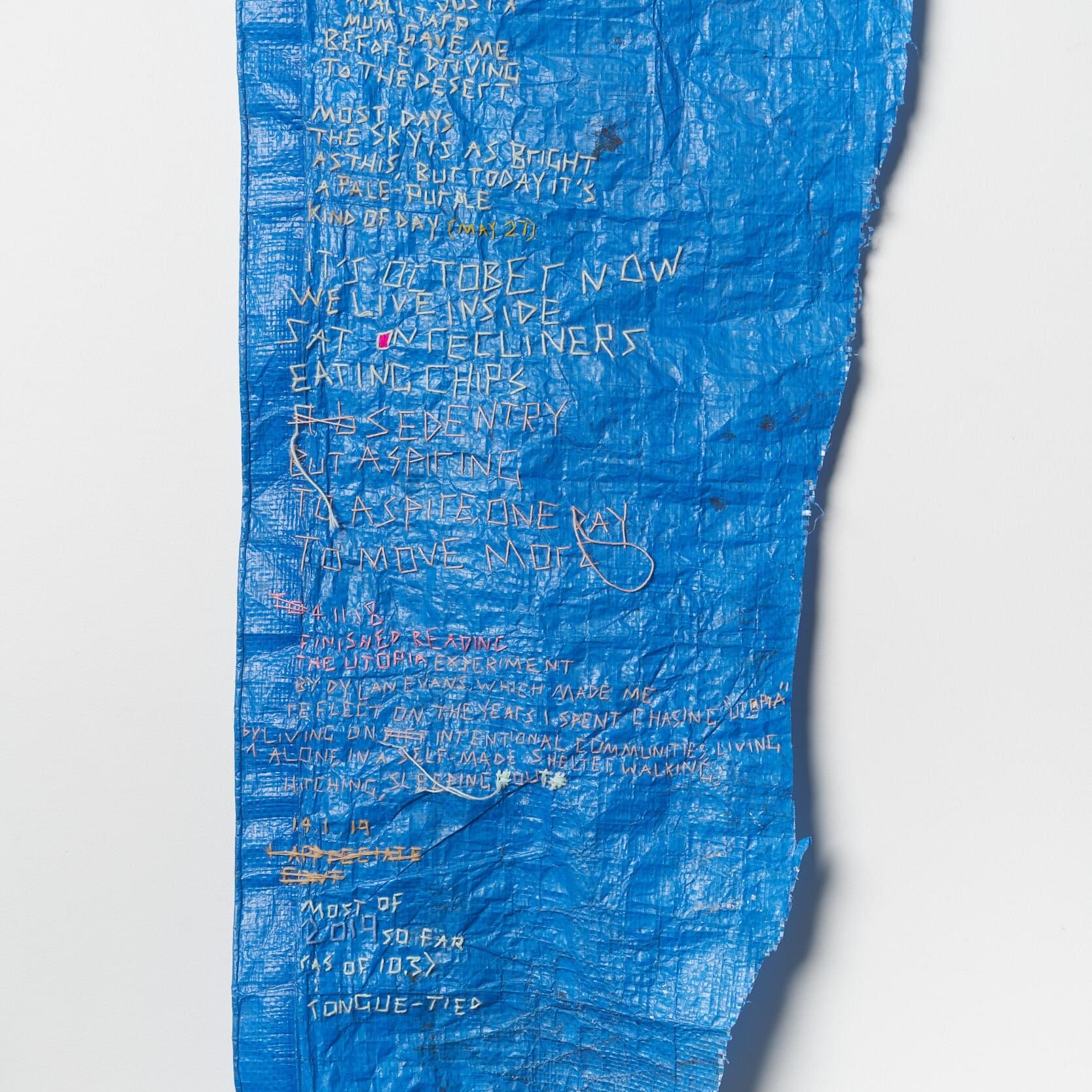 EXHIBITION RMIT Kasia Tons, Tarpaulin diary, 2018, cotton, synthetic tarp, paint, hand embroidery, 77.5cm x 45cm (framed). Courtesy of MARS and the artist