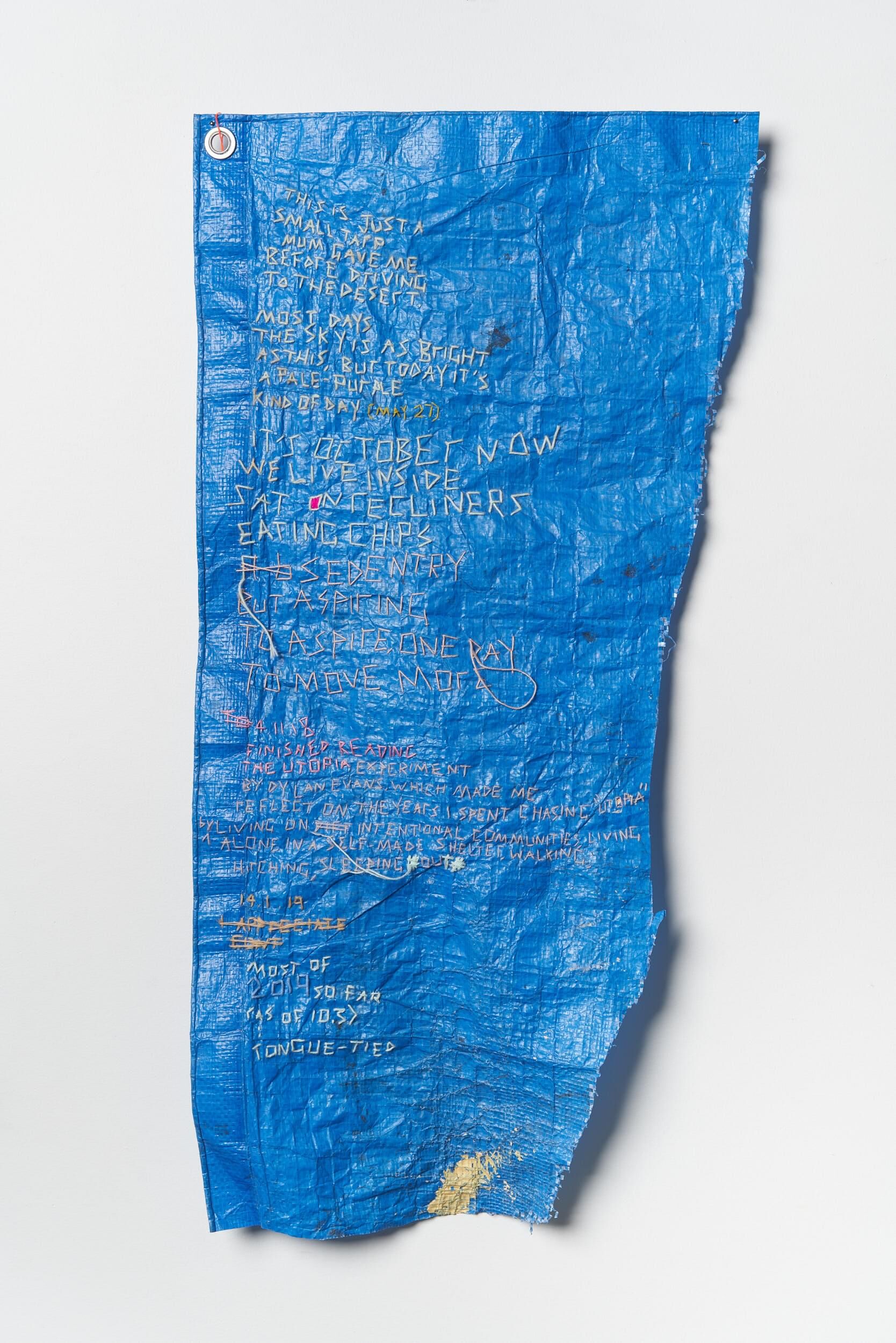 EXHIBITION RMIT Kasia Tons, Tarpaulin diary, 2018, cotton, synthetic tarp, paint, hand embroidery, 77.5cm x 45cm (framed). Courtesy of MARS and the artist